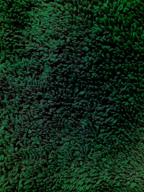 close up of green car wash towel